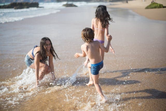 Kids playing at the beach · Borneo